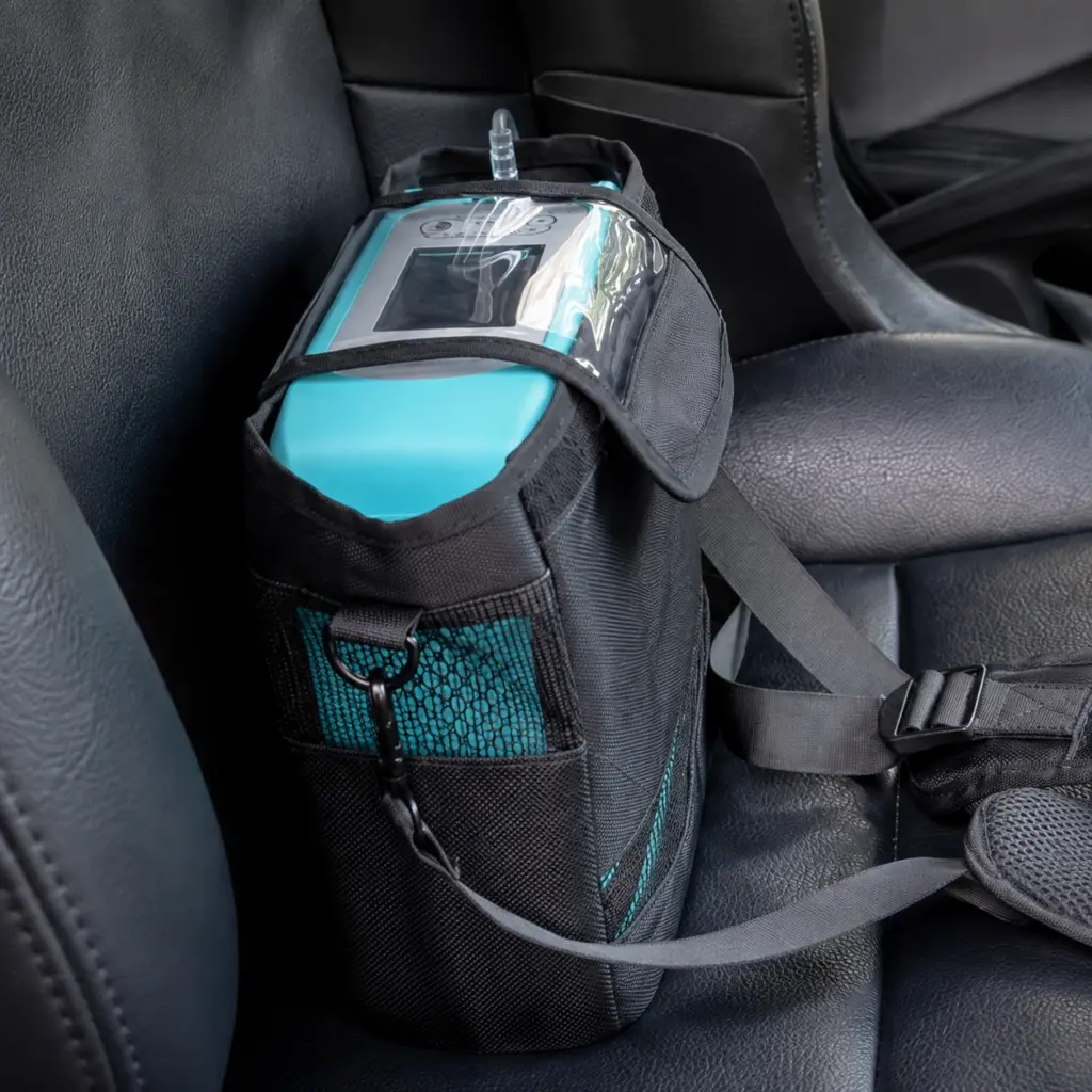 NORYLUME portable oxygen concentrator carry bag in a vehicle setting